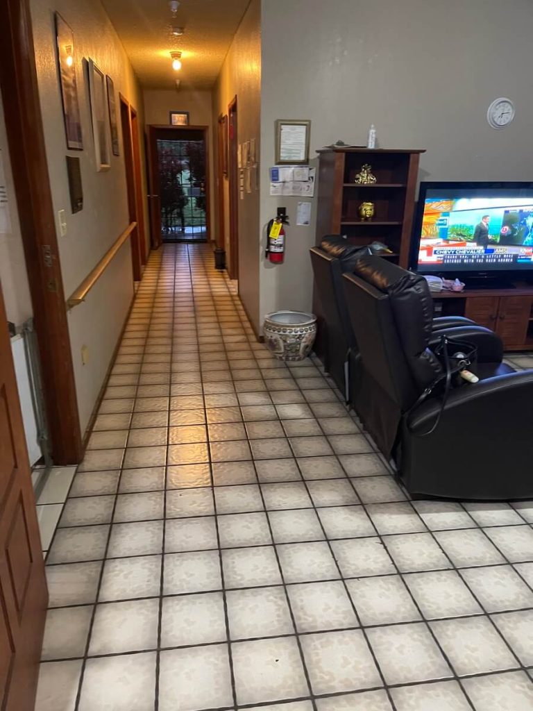 Large living area and hallway in JRR care home in Waipahu